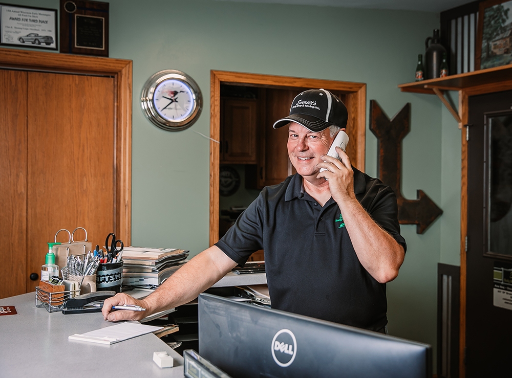 Bryan Niles Answering Call at Everett's Body Shop & Towing, Inc.